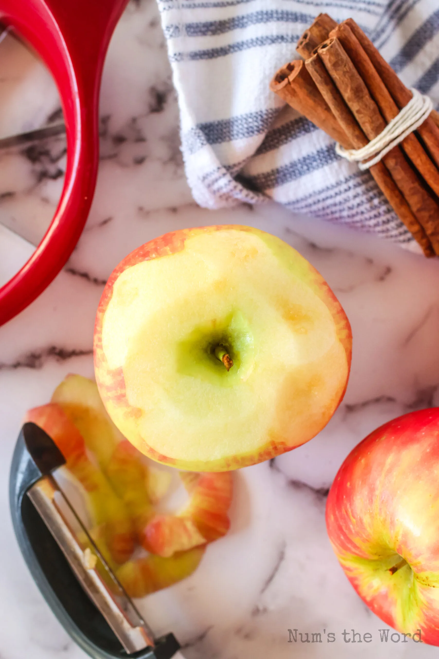 apples being peeled and prepared for applesauce