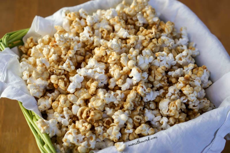 Microwave Caramel Corn - final product of caramel corn in a basket waiting to be eaten.