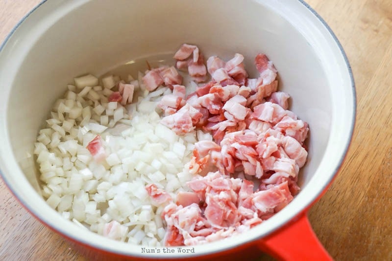 Bacon Cheeseburger Macaroni - Bacon and onions in a pan uncooked