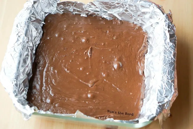 See's Fudge, A Copycat Recipe - warm fudge poured into lined pan