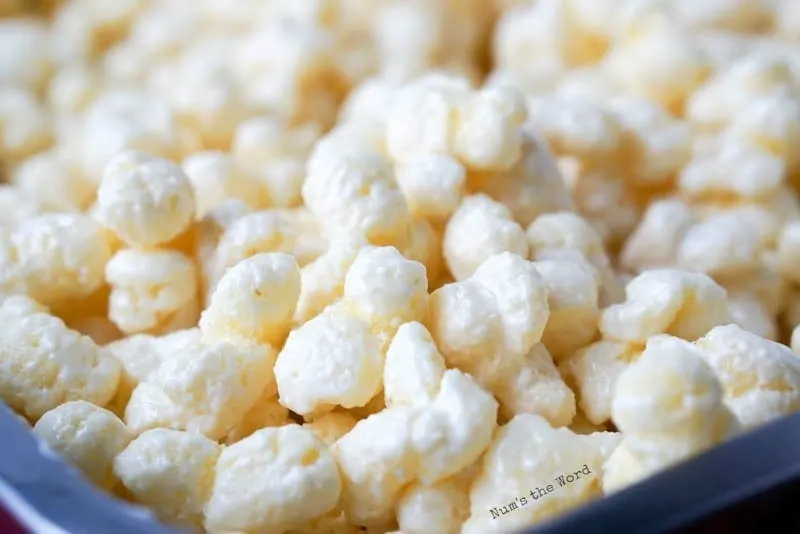 White Chocolate Puffcorn - chocolate is mixed in with puffcorn and ready to eat.