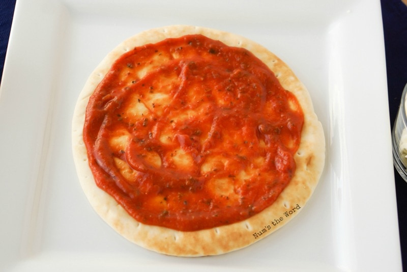 Flat Bread Pizza - Pizza sauce spread on flat bread