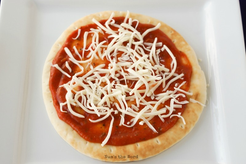 Flat Bread Pizza - cheese on top of pizza sauce