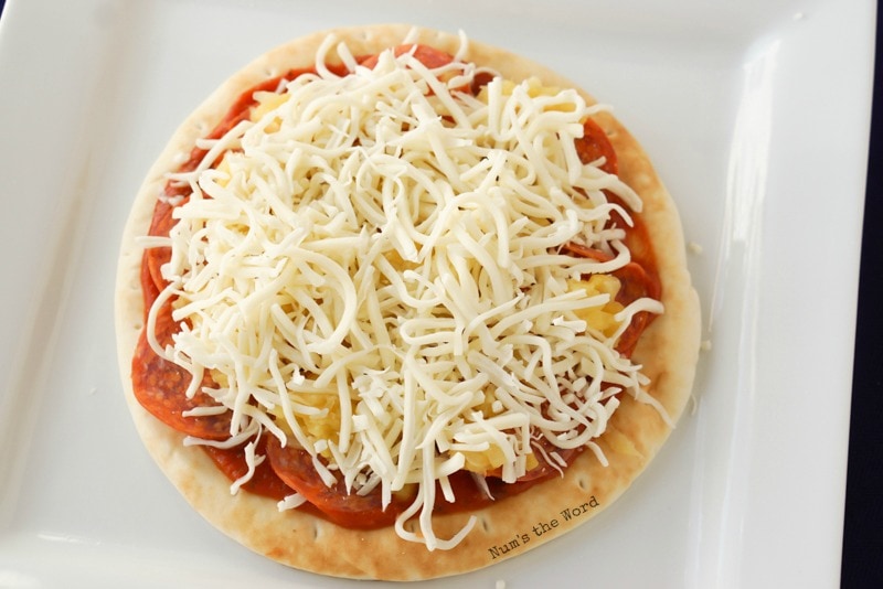 Flat Bread Pizza - Lots of mozzarella cheese on top of pineapple