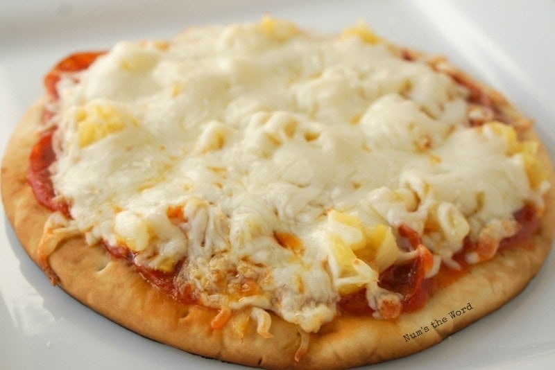Flat Bread Pizza - Pizza fresh out of oven with melted cheese