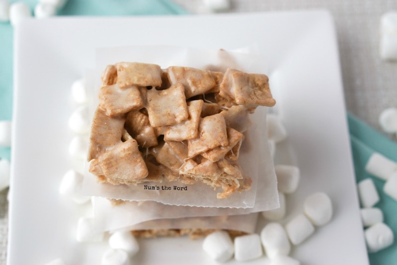 Churro Marshmallow Treats - Churro treats stacked on a plate