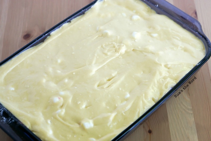 Rhubarb mixture topped jello, marshmallows and lemon cake batter