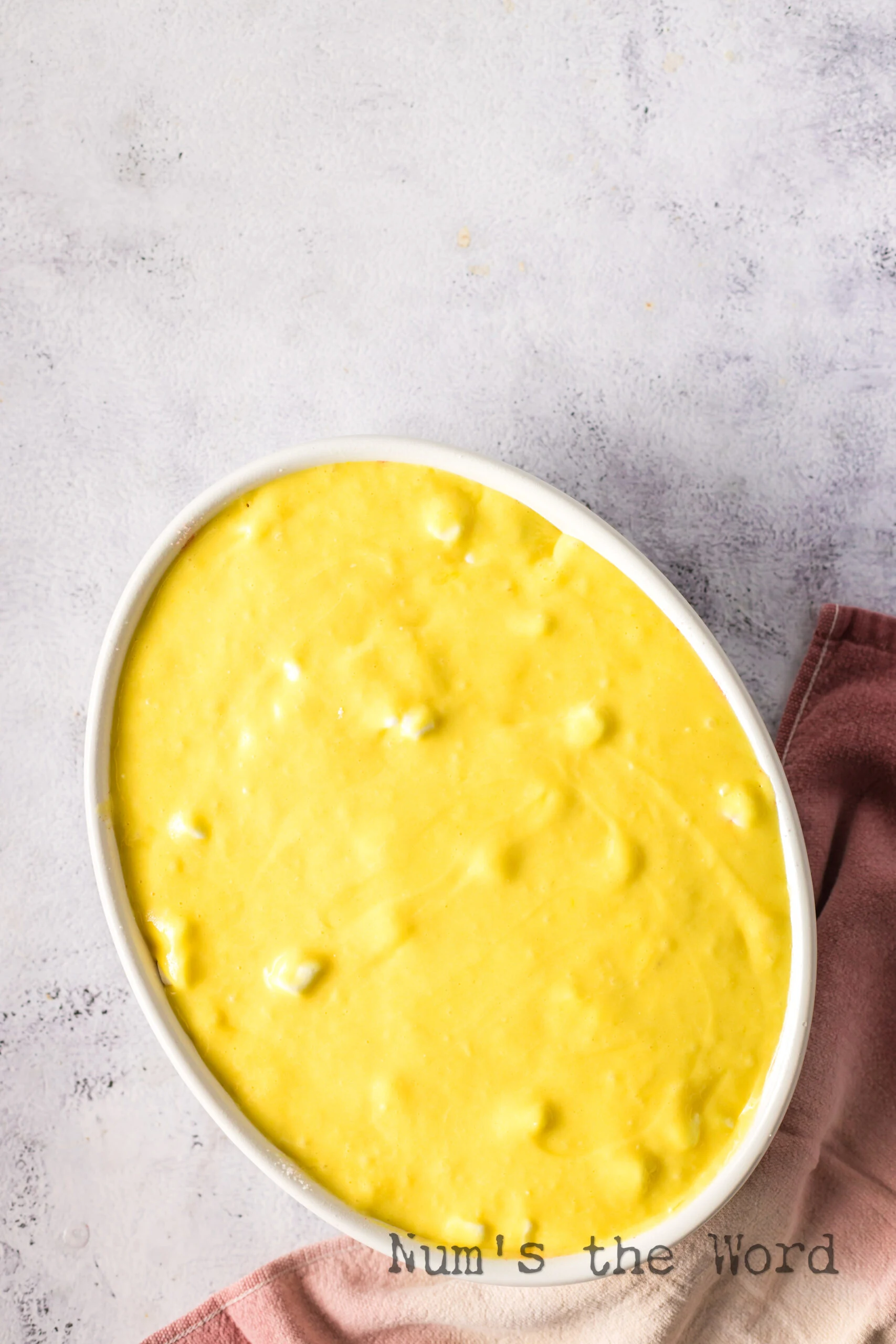 cake mix poured over sugared rhubarb mixture.