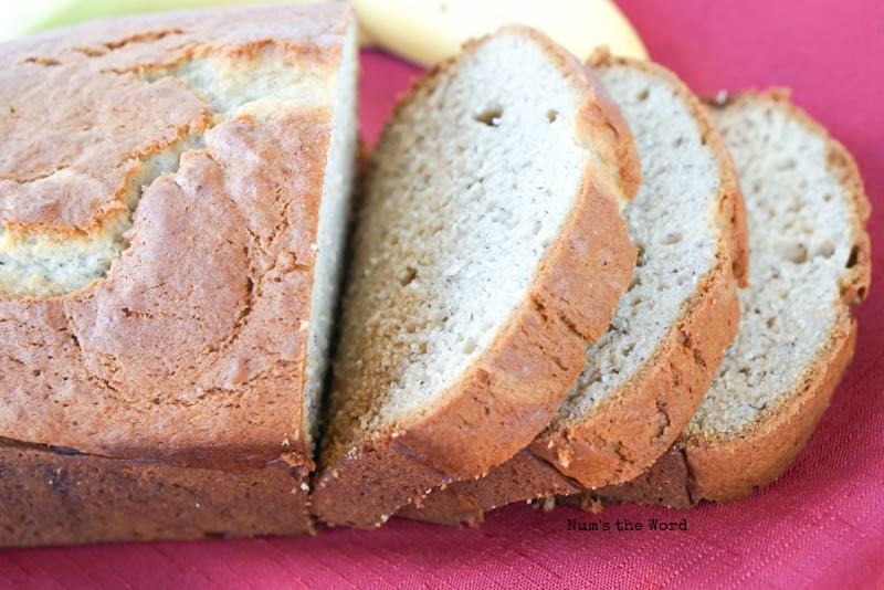 Best Ever Banana Bread - Sliced and ready to be eaten - side angle view