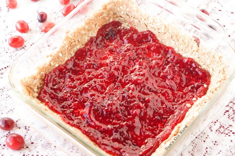 Leftover Cranberry Sauce Bars - cranberry sauce on top of bottom crust