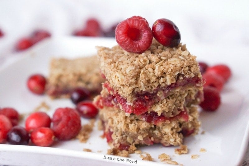 Leftover Cranberry Sauce Bars - down angle of cranberry bars stacked on top of each other.