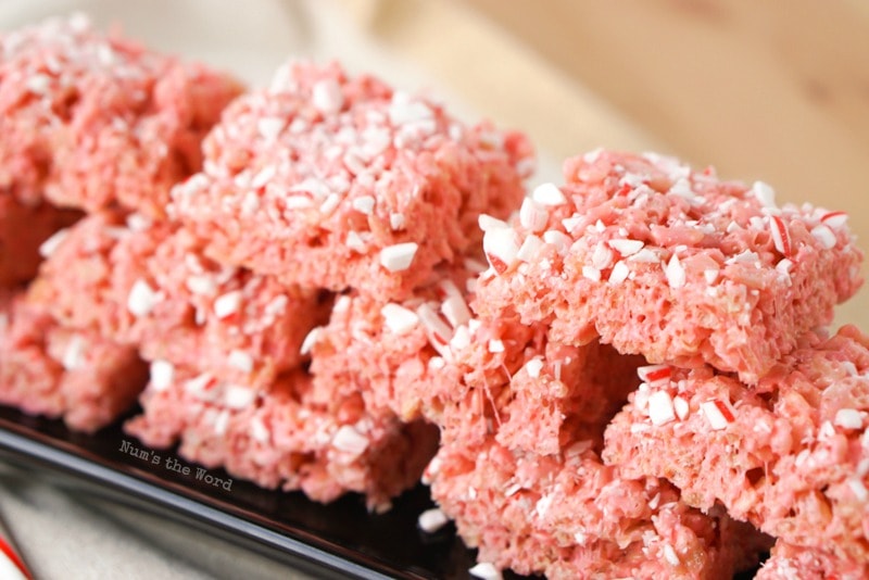 Peppermint Rice Krispy Treats - side and down angel of treats on a platter up close