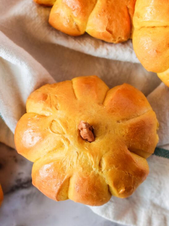 close up of a pumpkin tilted to show the top of the bread roll