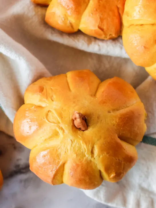 close up of a pumpkin tilted to show the top of the bread roll