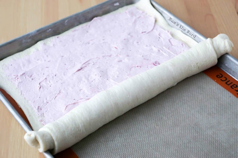 Leftover Cranberry Sauce Roll Ups - photo showing how to roll up dough