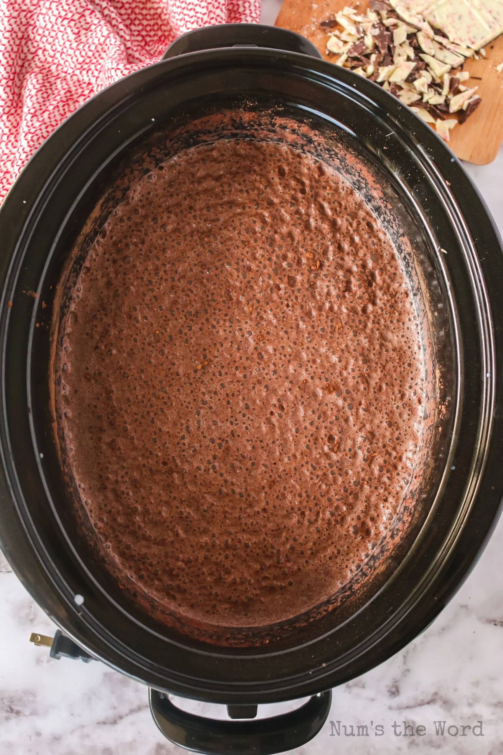 Mixture well mixed with cocoa powder settling to the top of crock pot