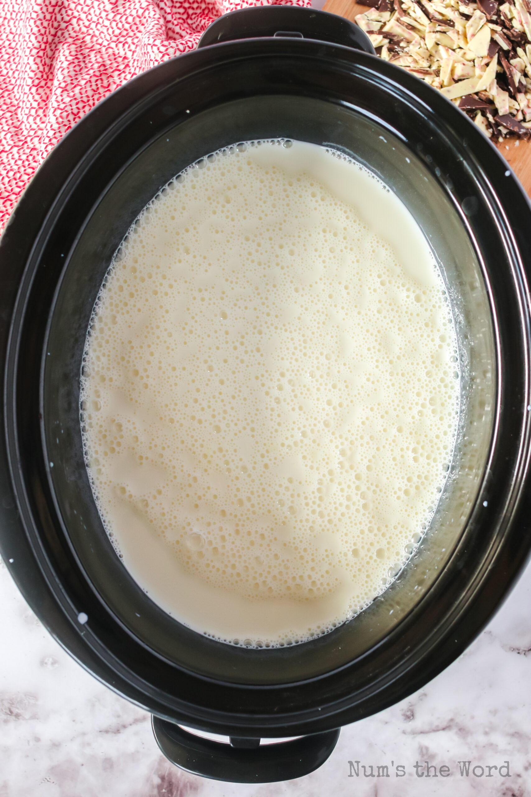 sweetened condensed milk and regular milk in a crock pot
