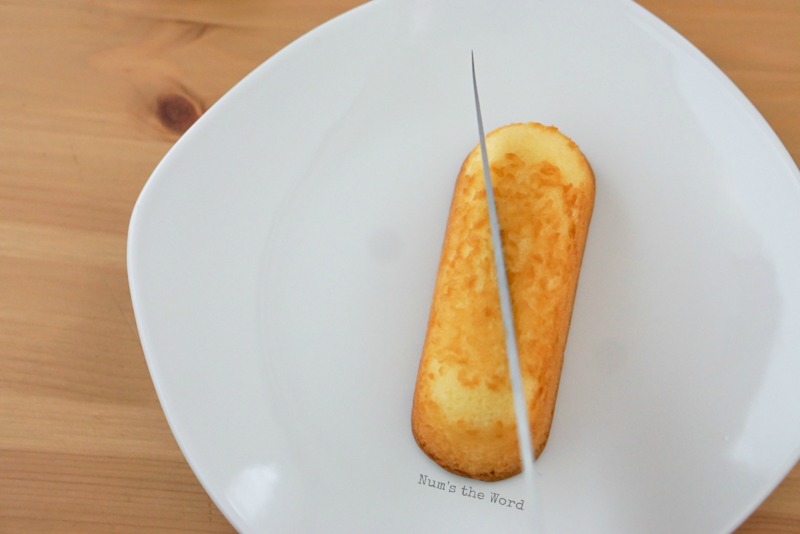 Twinkie Hearts - Showing how to cut first twinkie with knife at angle to the left.