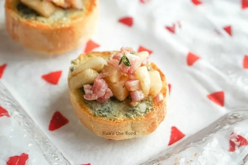 Pear & Proscuitto Bruschetta - single bite up close showing final product