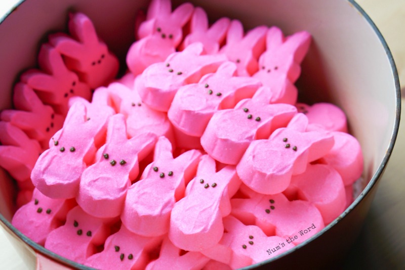 Pink peeps in a soup pot, uncooked.