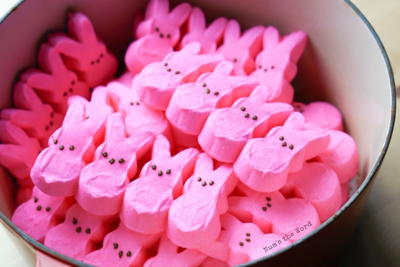 Peeps Popcorn Balls - Hot pink peeps in a pan ready to be cooked down.