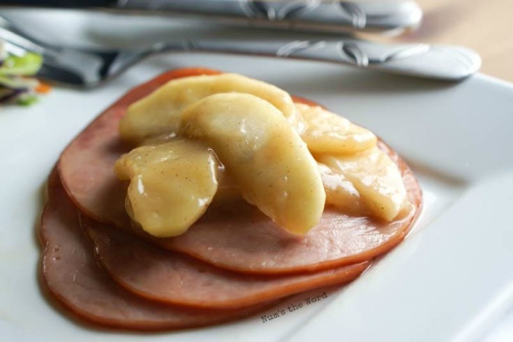 Ham Steaks with Sauteed Apples - ham steaks on plate with sauteed apples on top