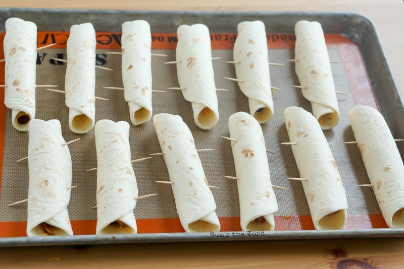 Pulled Pork Flautas - Tortillas rolled and speared with a toothpick.