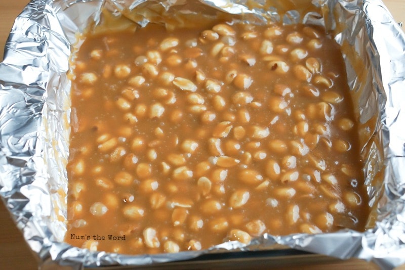 Salted Peanut Caramels - Freshly poured peanut caramels into pan