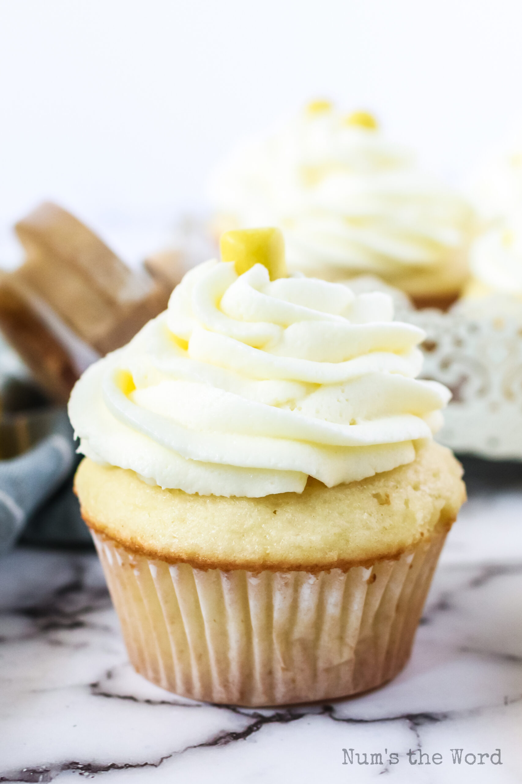 side view of single cupcake ready to eat