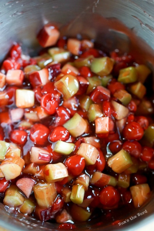 Cherry Rhubarb Crisp - cherry pie filing and rhubarb in a bowl.