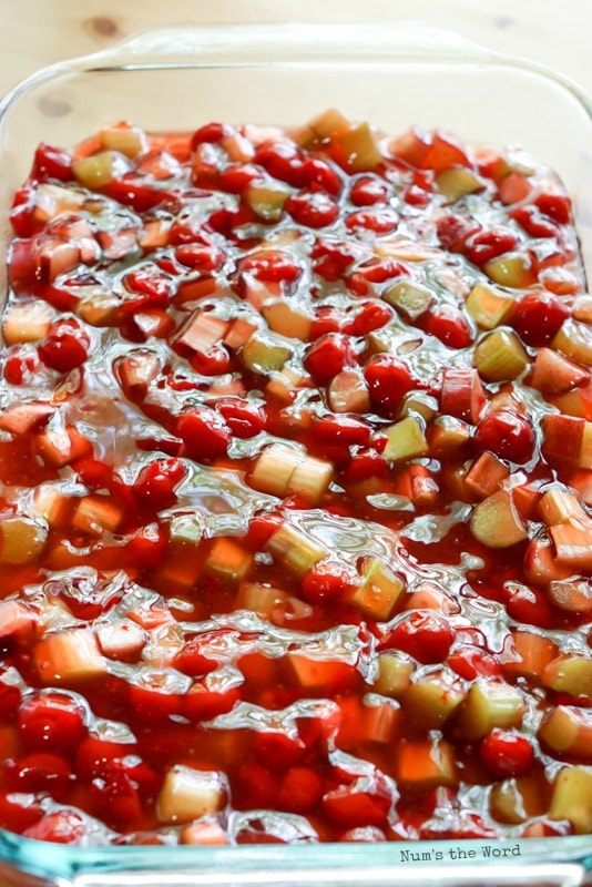 Cherry Rhubarb Crisp - rhubarb mixture in a casserole dish.