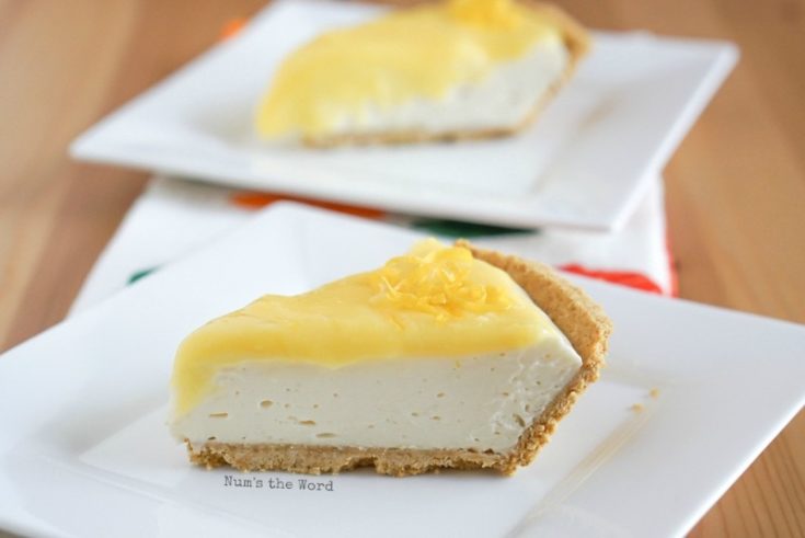 No Bake Lemon Cheesecake - two slices of cheesecake on plate. Photo taken from side view.