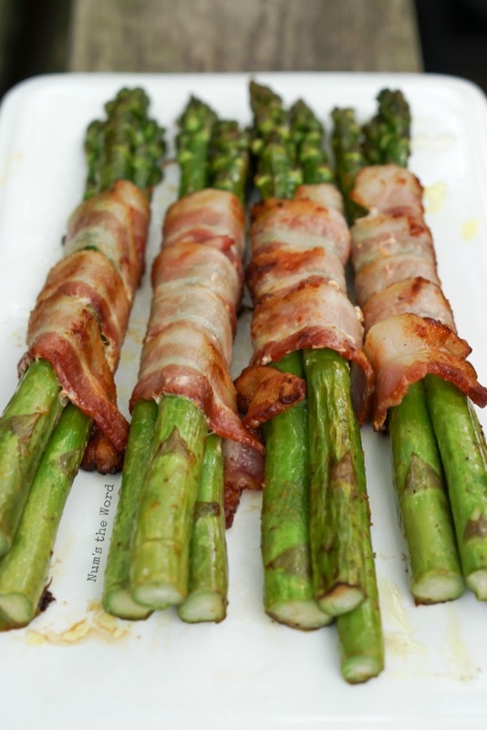 Bacon Wrapped Asparagus - Grilled asparagus on platter ready to be eaten!