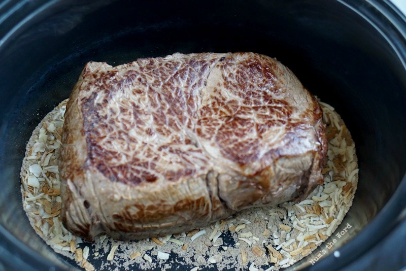 Cranberry Pot Roast - Seared roast on top of onion soup mix