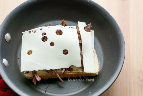 Leftover Pot Roast Grilled Cheese - open sandwich, uncooked with another slice of cheese on top.