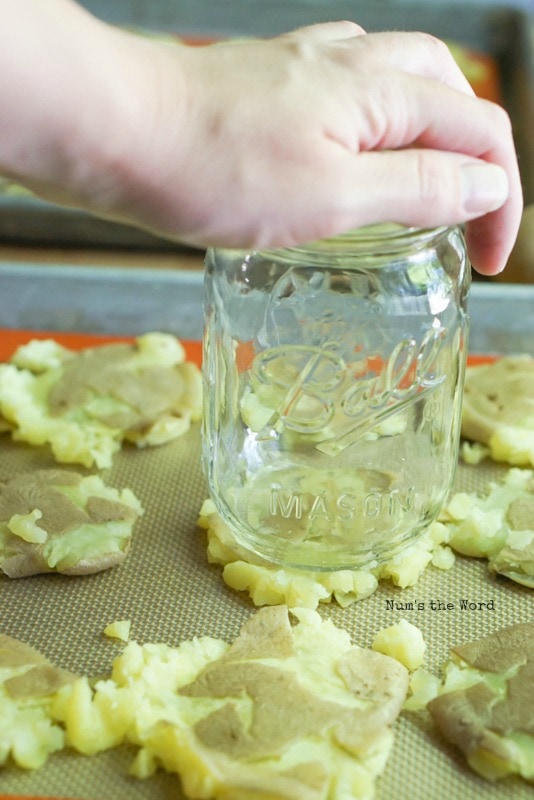 Loaded Smashed Potatoes - Glass jar over potato to show how I smashed them