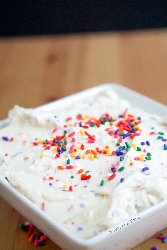 Funfetti Buttercream Frosting - side angle of frosting in a bowl