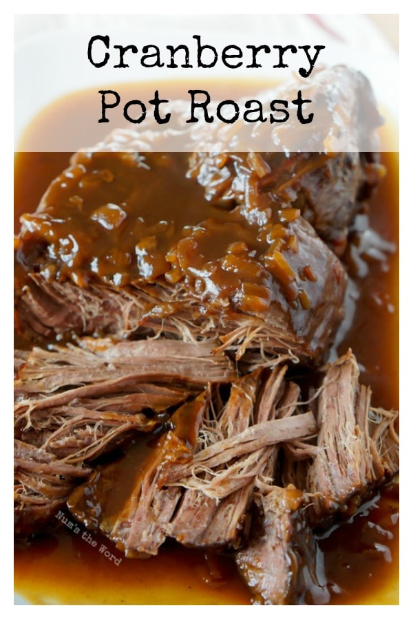 Cranberry Pot Roast - main image for recipe of cooked pot roast on a platter and pulled apart