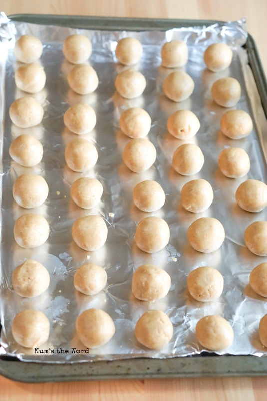 Peanut Butter Cup Truffles - truffles lined up on a cookie sheet