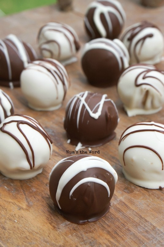 truffle balls laid out on a cutting board