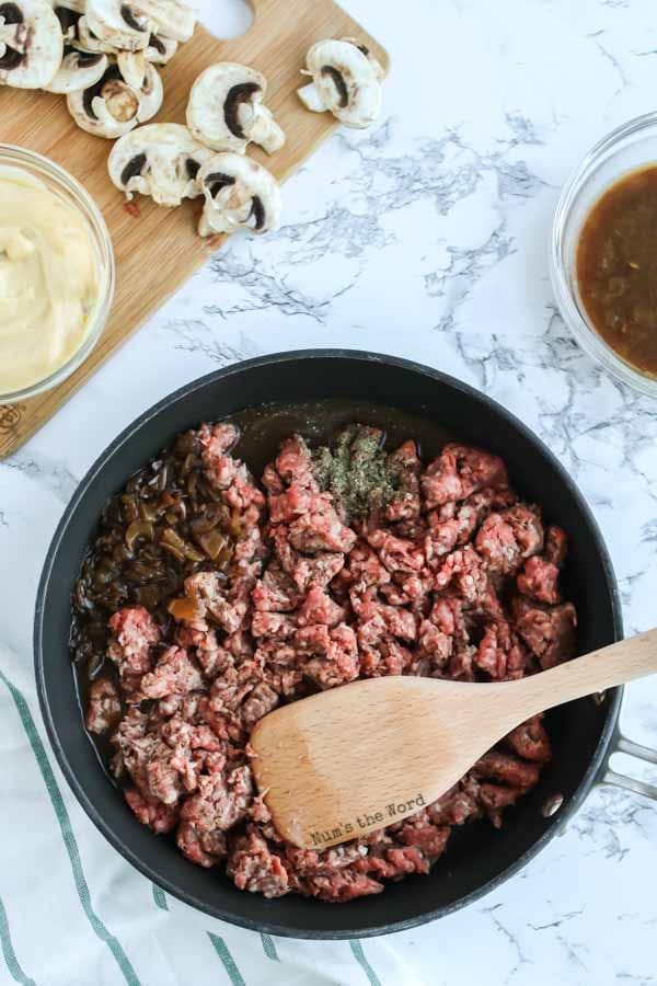 Salisbury Steak Casserole Recipe - ground beef, french onion soup and pepper in a deep skillet.