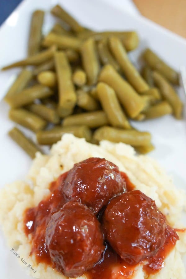 Chili Cranberry Meatballs - close up of meatballs on plate.