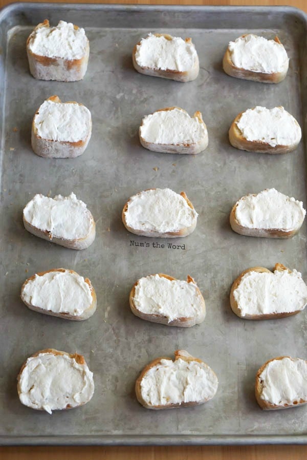 Leftover Cranberry Sauce Bruschetta - cream cheese smeared on top of each bruschetta