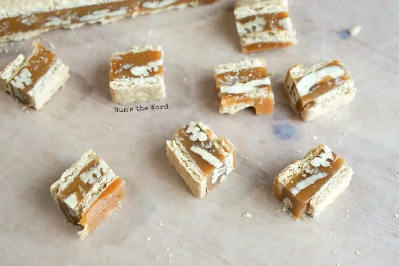 Crunchy Coconut Caramel Clusters - cut squares off of caramel slab before chocolate