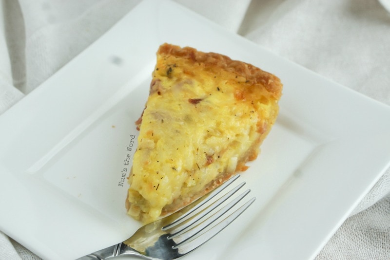 Ham & Cheese Quiche - slice of quiche on a plate