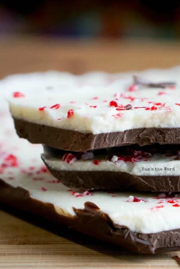 Homemade Peppermint Bark - large pieces of peppermint bark stacked on top of each other.