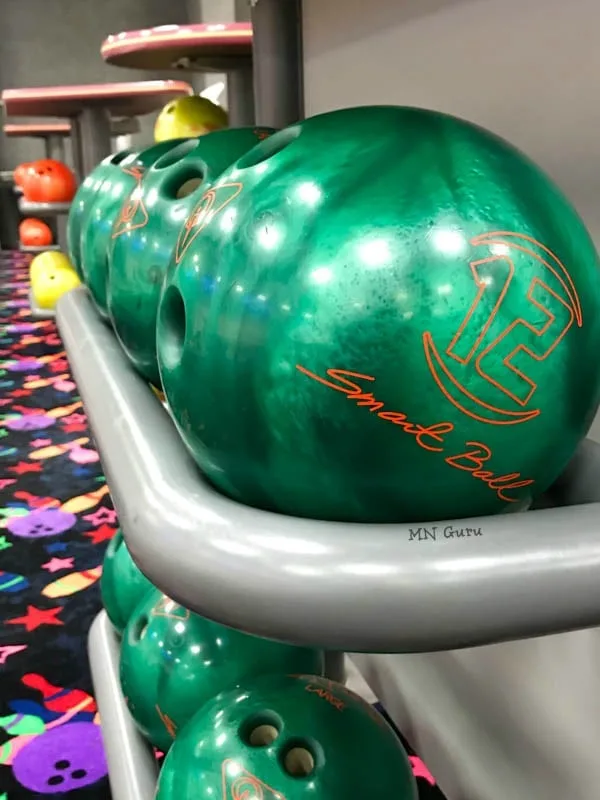 The Underground Bowling Alley - green balls all lined up