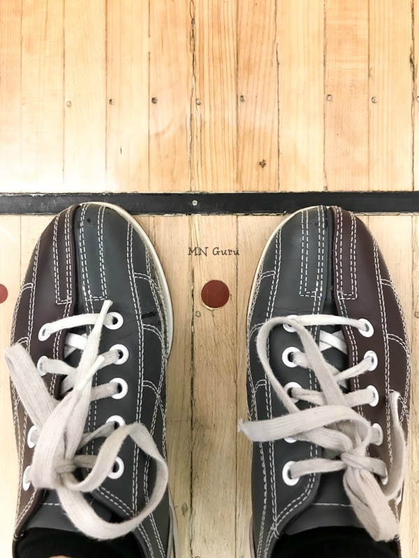 The Underground Bowling Alley - Bowling shoes on bowling floor