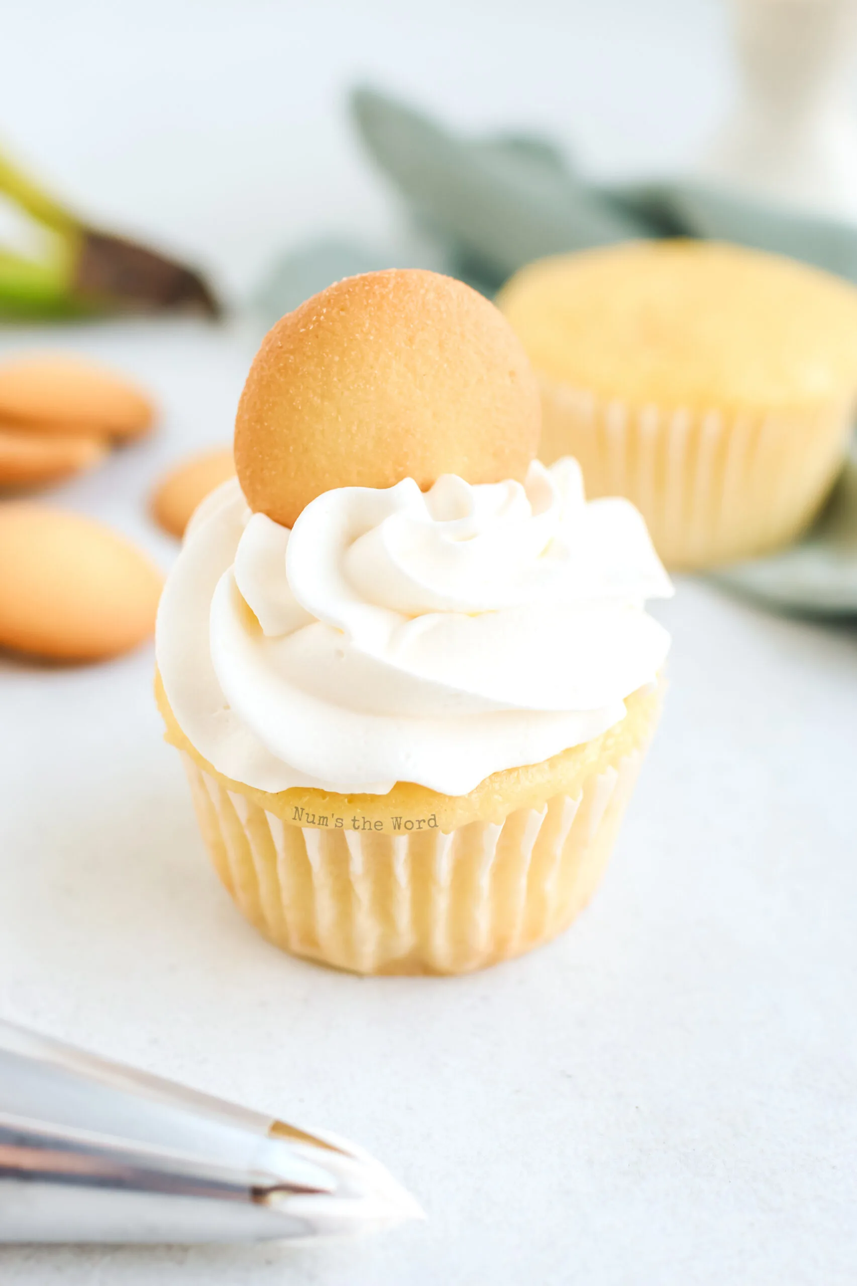 cool whip frosting on cupcake with a nilla wafer, ready to eat!