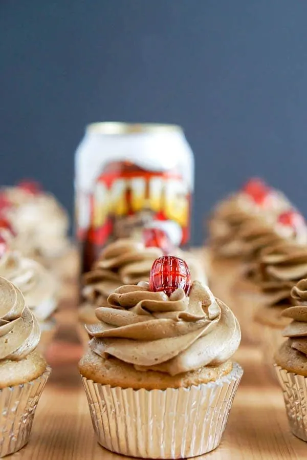 Root beer Float Cupcakes - cupcakes with can or root beer in background